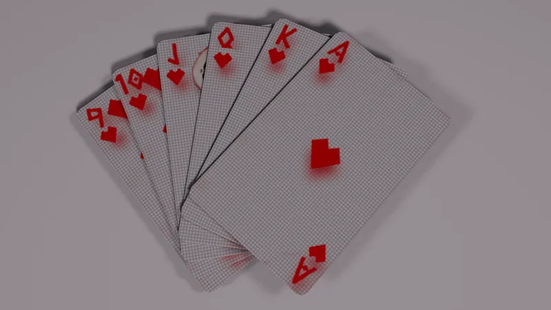 A hand of playing cards fanned out, from nine to ace