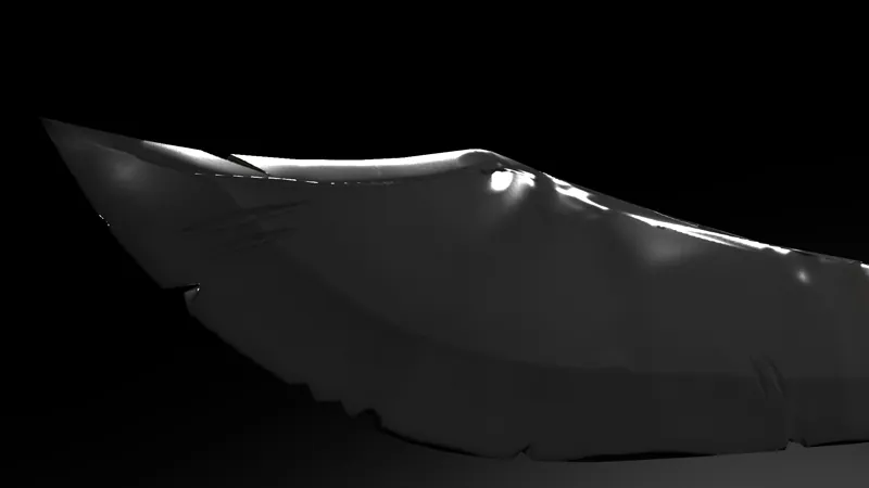 Close-up of the cutlass blade tip and worn, chipped edge in dramatic low light