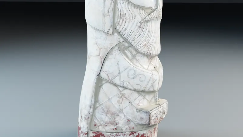 Close-up of the Thor Totem body, showing carved knotwork, the hammer and the red-stained base