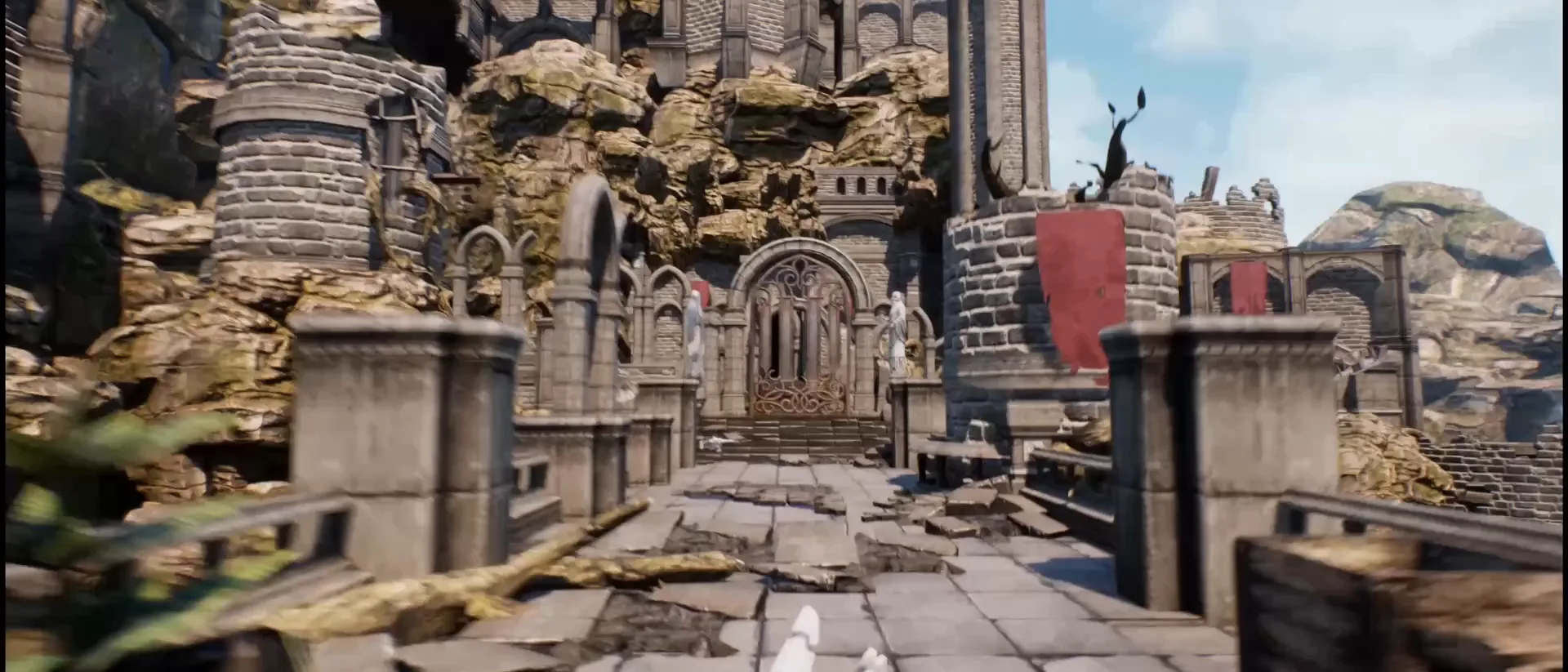 A first-person view of a ruined stone fortress with stairs, arches and rocky cliffs
