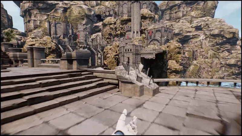 A first-person view of stone stairs leading up to a ruined fortress with a broken object in the foreground